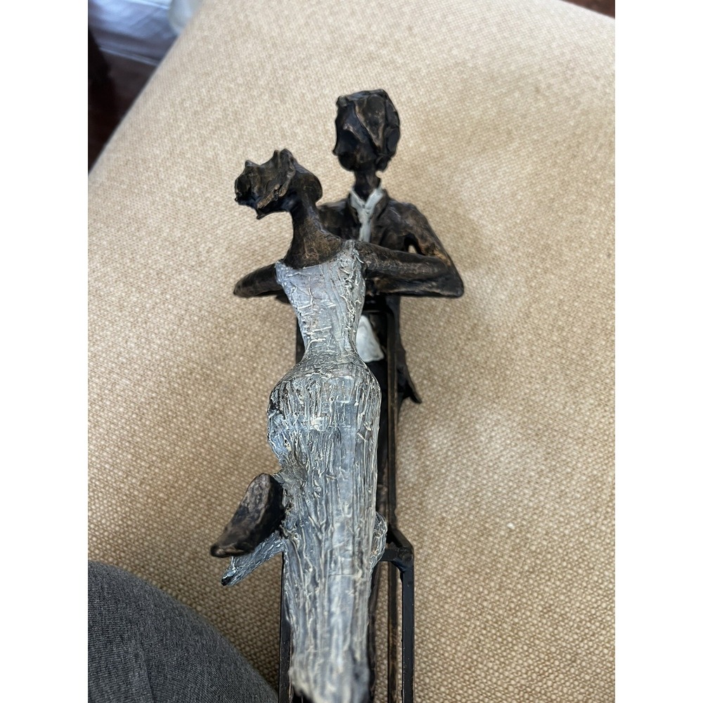 Dancers Statue Mel and female embrace the art of dance